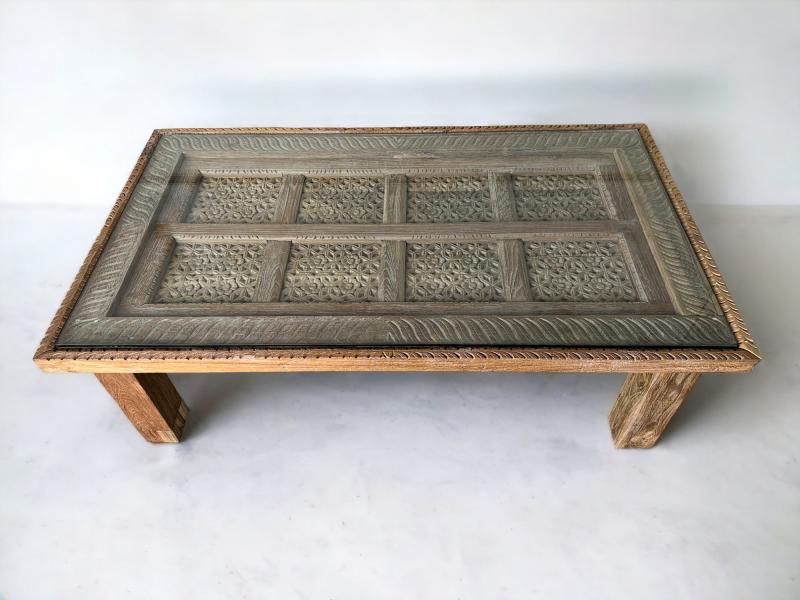 Carved wood on sale coffee table